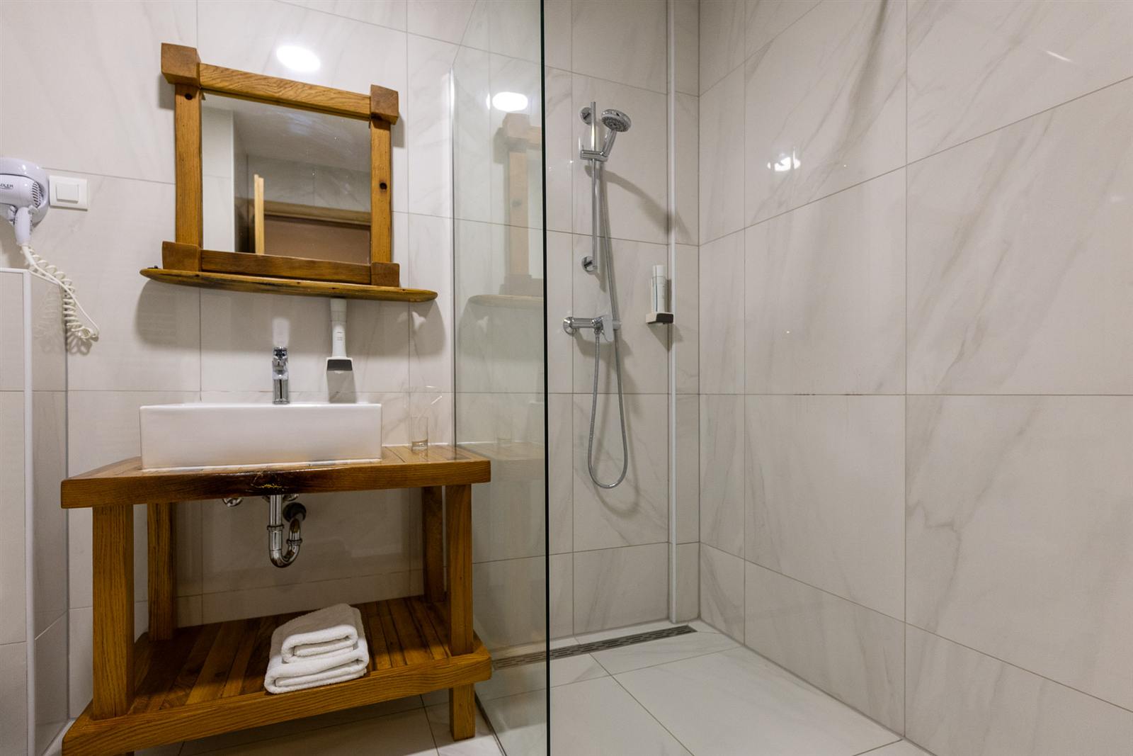 Marble bathroom with rain shower
